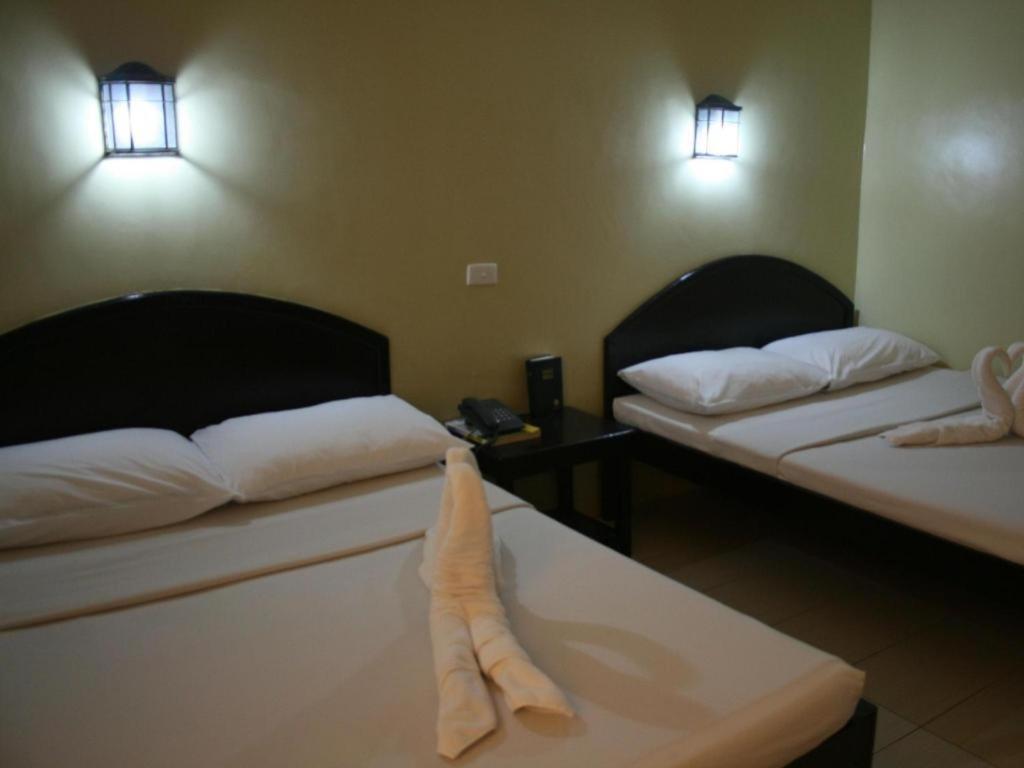 Sampaguita Suites Plaza Garcia Себу Экстерьер фото
