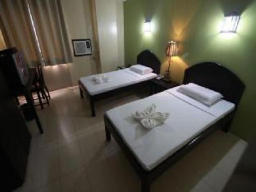 Sampaguita Suites Plaza Garcia Себу Экстерьер фото