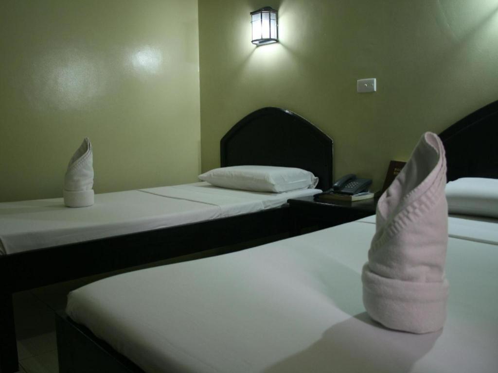 Sampaguita Suites Plaza Garcia Себу Экстерьер фото