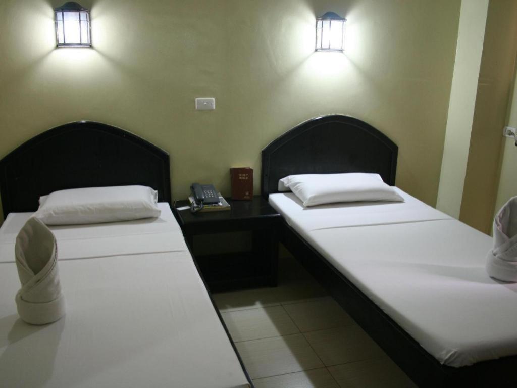 Sampaguita Suites Plaza Garcia Себу Экстерьер фото